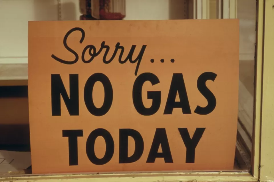 A sign reads “Sorry No Gas Today”.